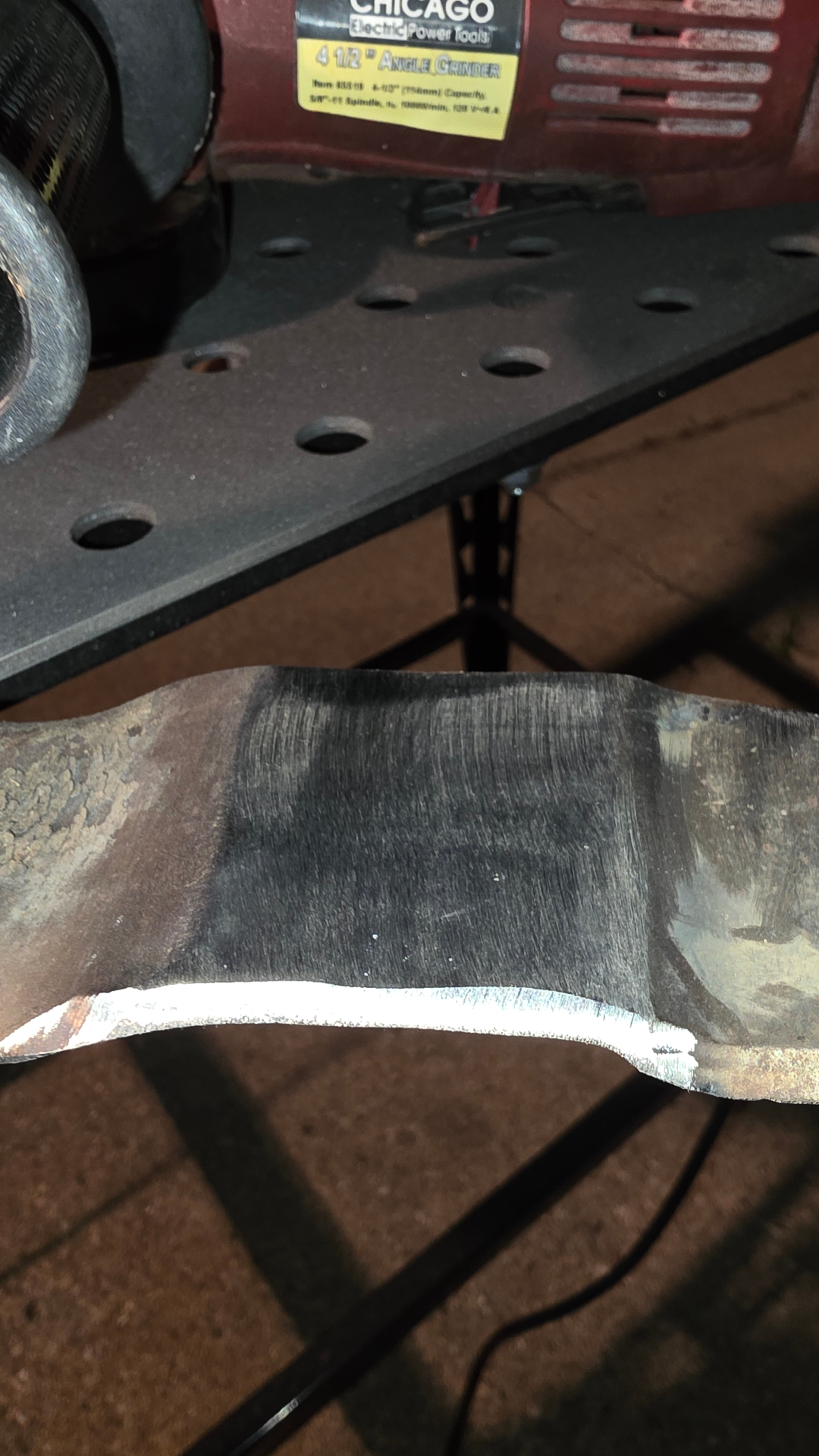 Lawnmower blade after weld repair